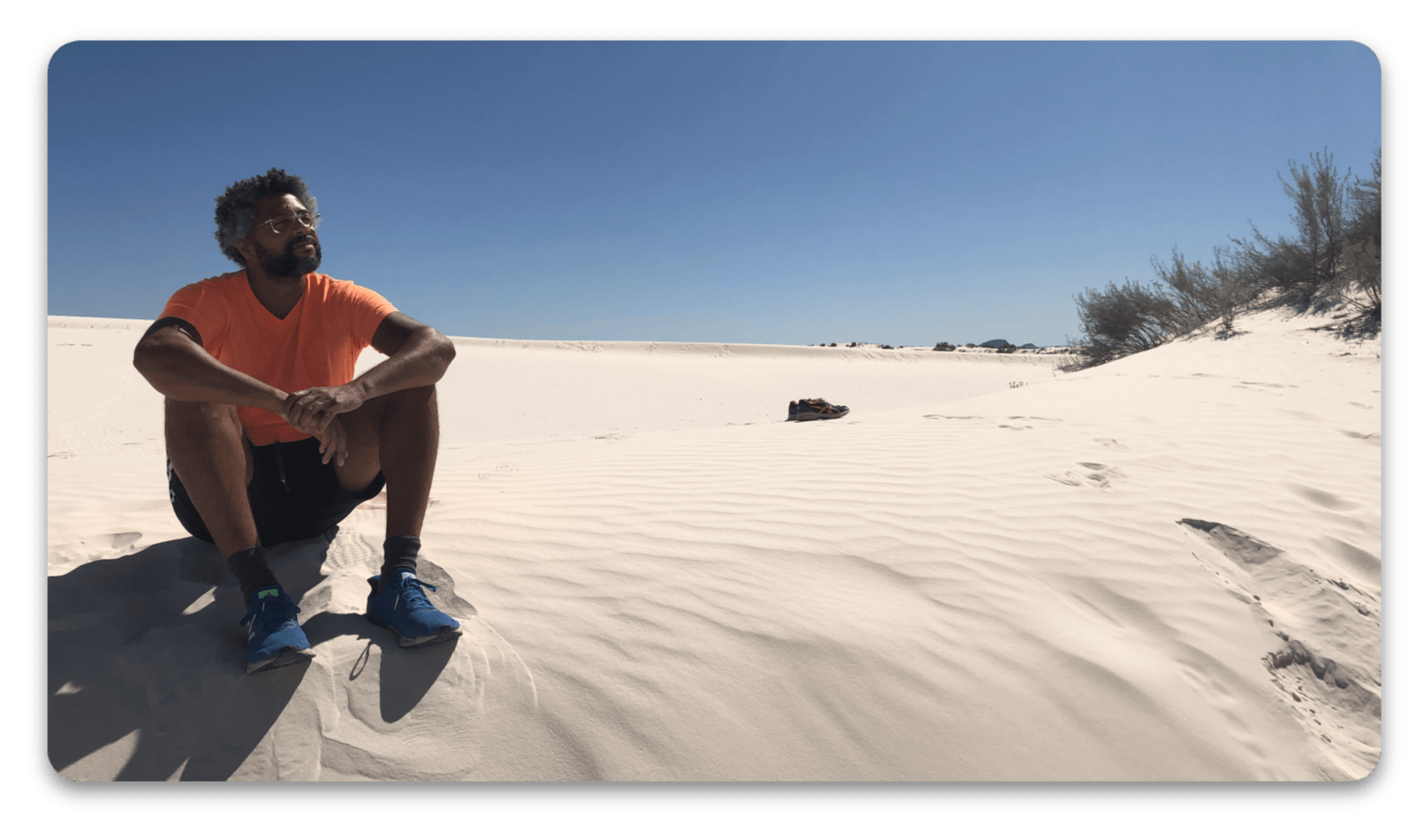 A picture of me (the author of Evolve Tracking), sitting on a dune 